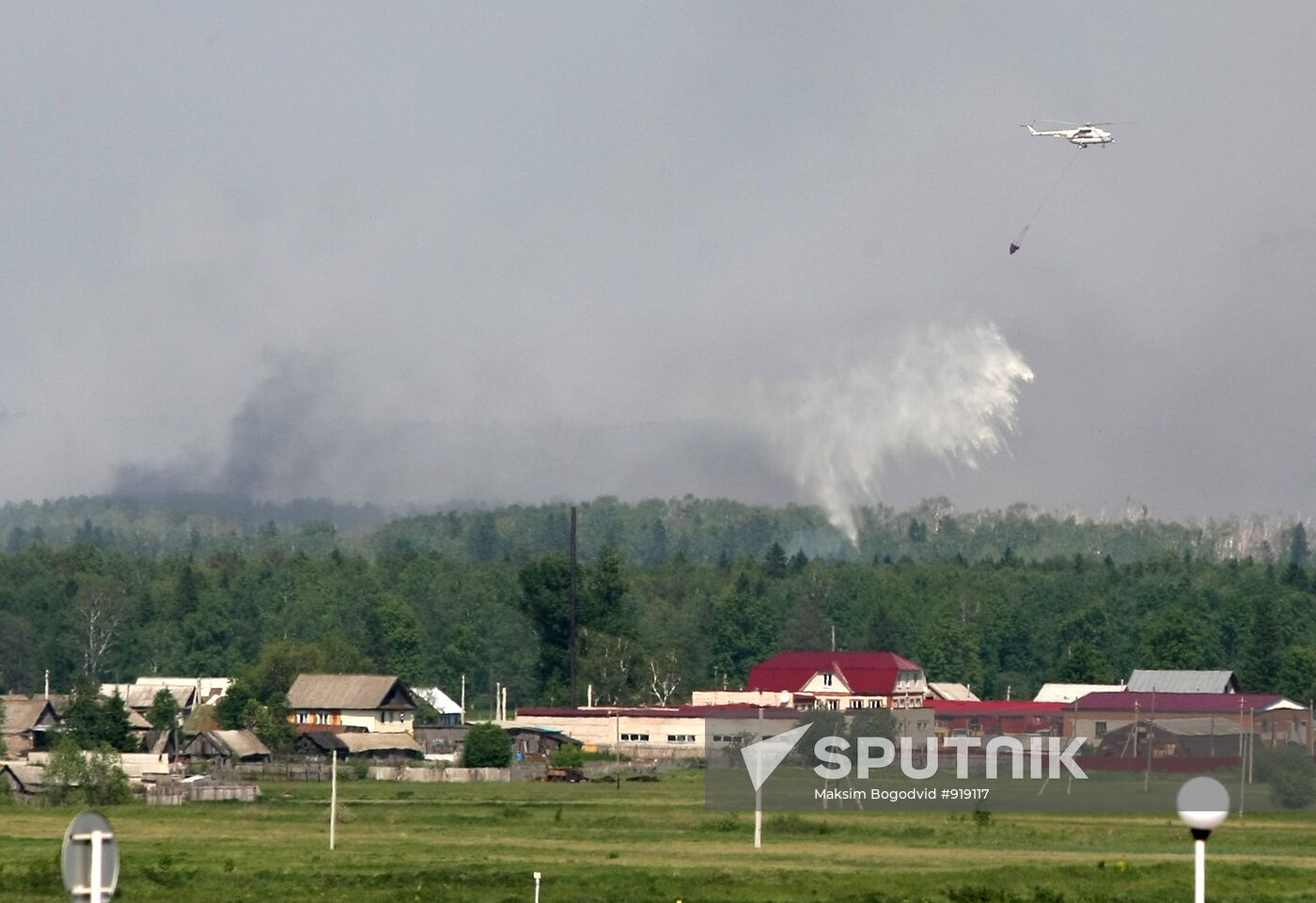 Helicopter extinguishes fire at military deport in Udmurtia