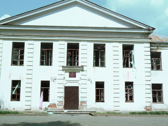 Secondary school building with broken windows