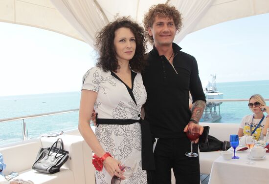 Kseniya Rappoport with companion