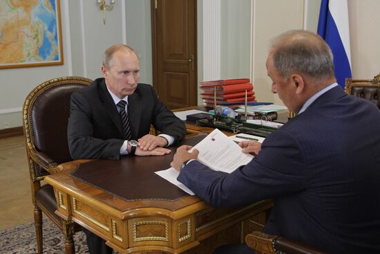 Vladimir Putin meets with Vladimir Dmitriev