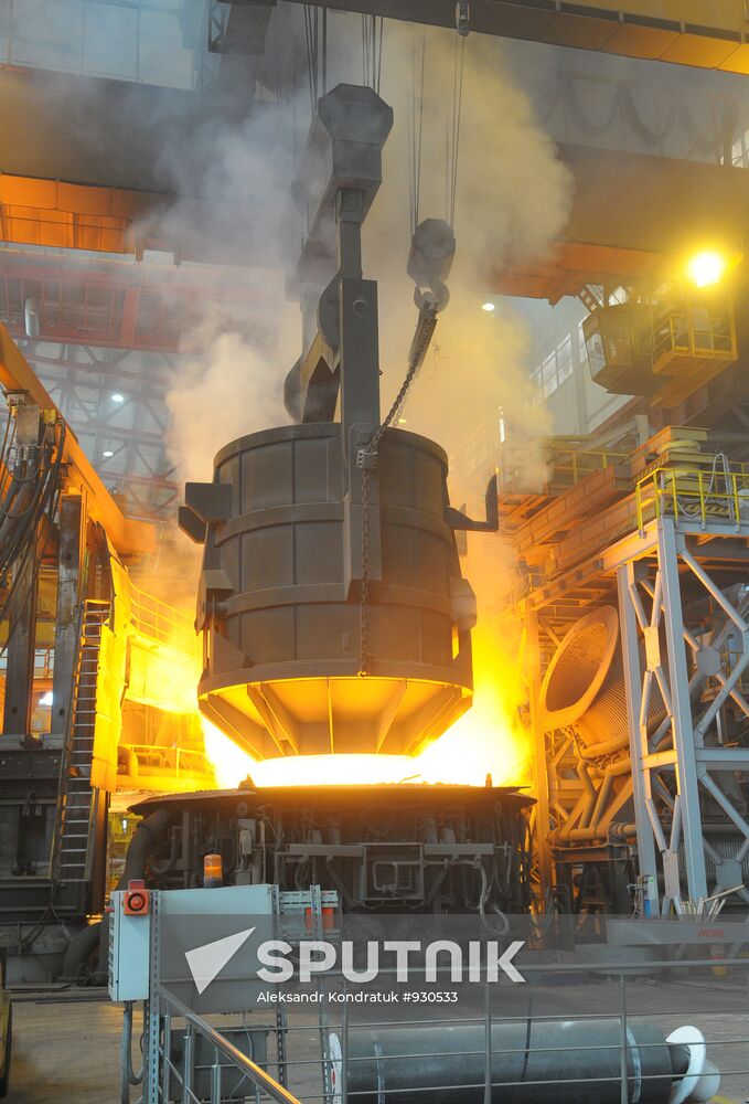 Scrap metal loaded into electric arc furnace