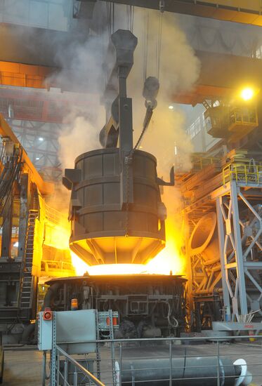 Scrap metal loaded into electric arc furnace