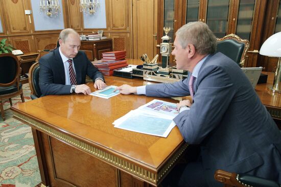 Prime Minister Vladimir Putin meets with Andrei Krainy