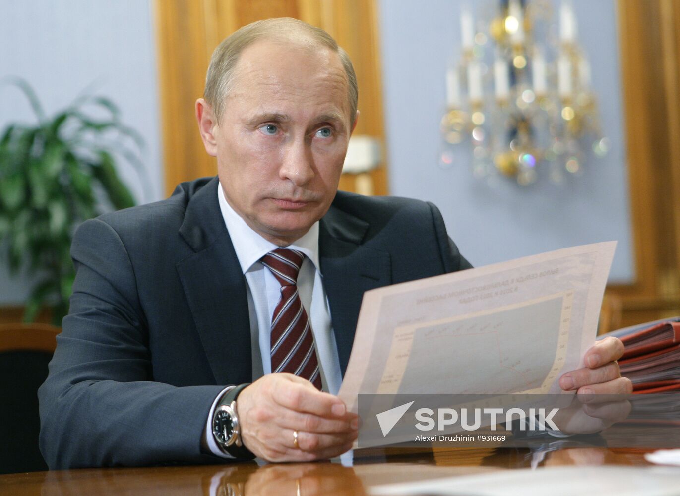 Prime Minister Vladimir Putin meets with Andrei Krainy