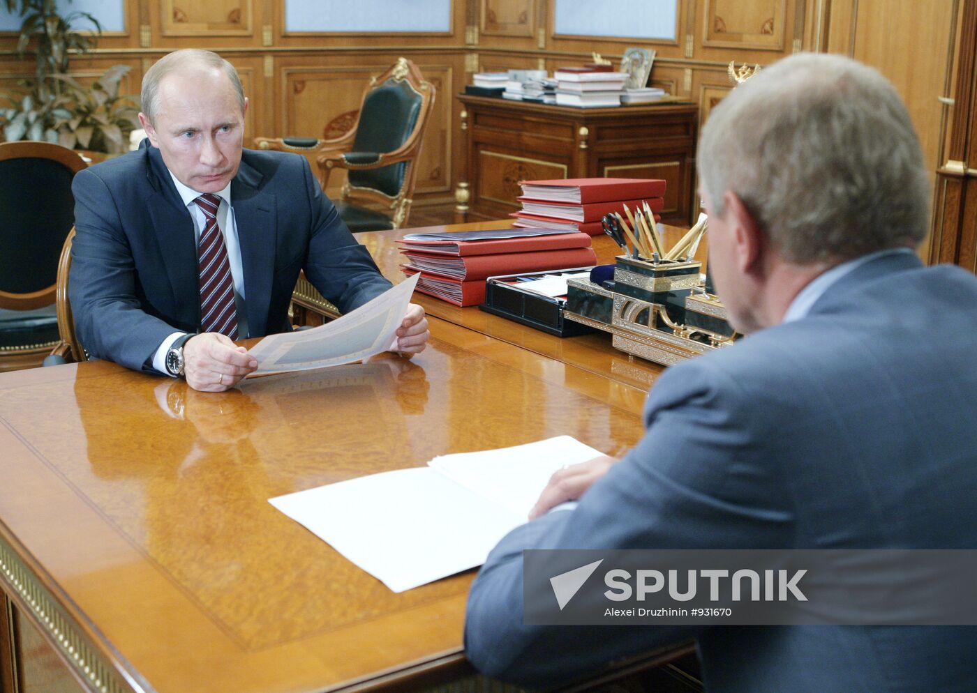 Prime Minister Vladimir Putin meets with Andrei Krainy