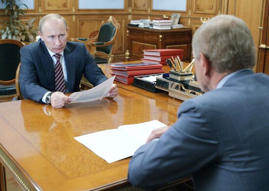 Prime Minister Vladimir Putin meets with Andrei Krainy