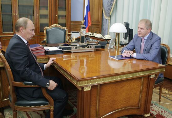 Prime Minister Vladimir Putin meets with Andrei Krainy