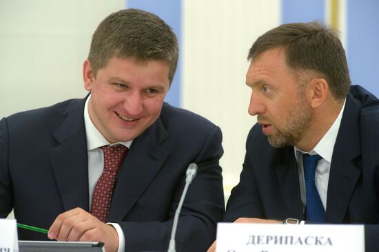 Oleg Deripaska and Yevgeny Dod