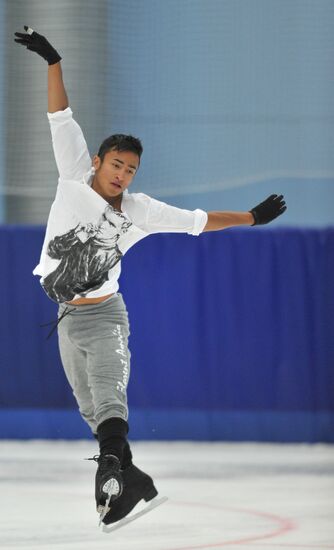 Coach Nikolai Morozov holds training session with his skaters
