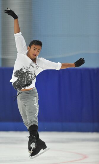 Coach Nikolai Morozov holds training session with his skaters