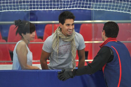 Coach Nikolai Morozov holds training session with his skaters