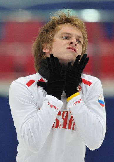 Coach Nikolai Morozov holds training session with his skaters