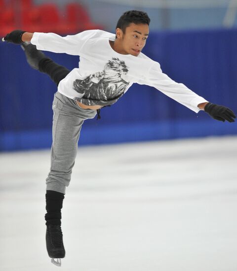 Coach Nikolai Morozov holds training session with his skaters
