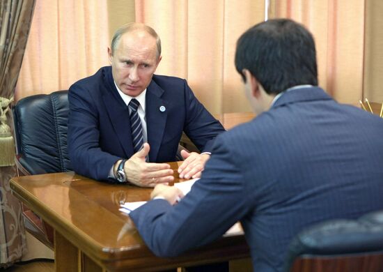 Vladimir Putin talks to Mikhail Yurevich