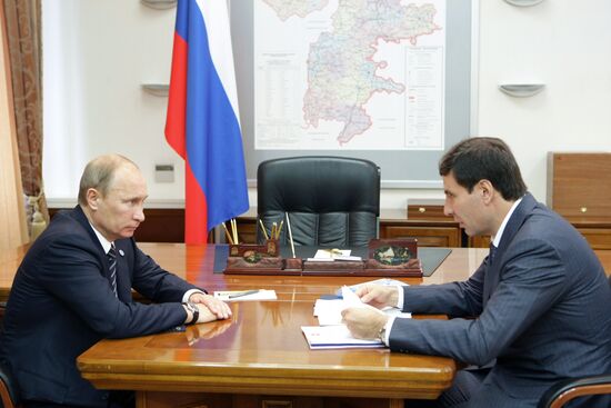 Vladimir Putin talks to Mikhail Yurevich
