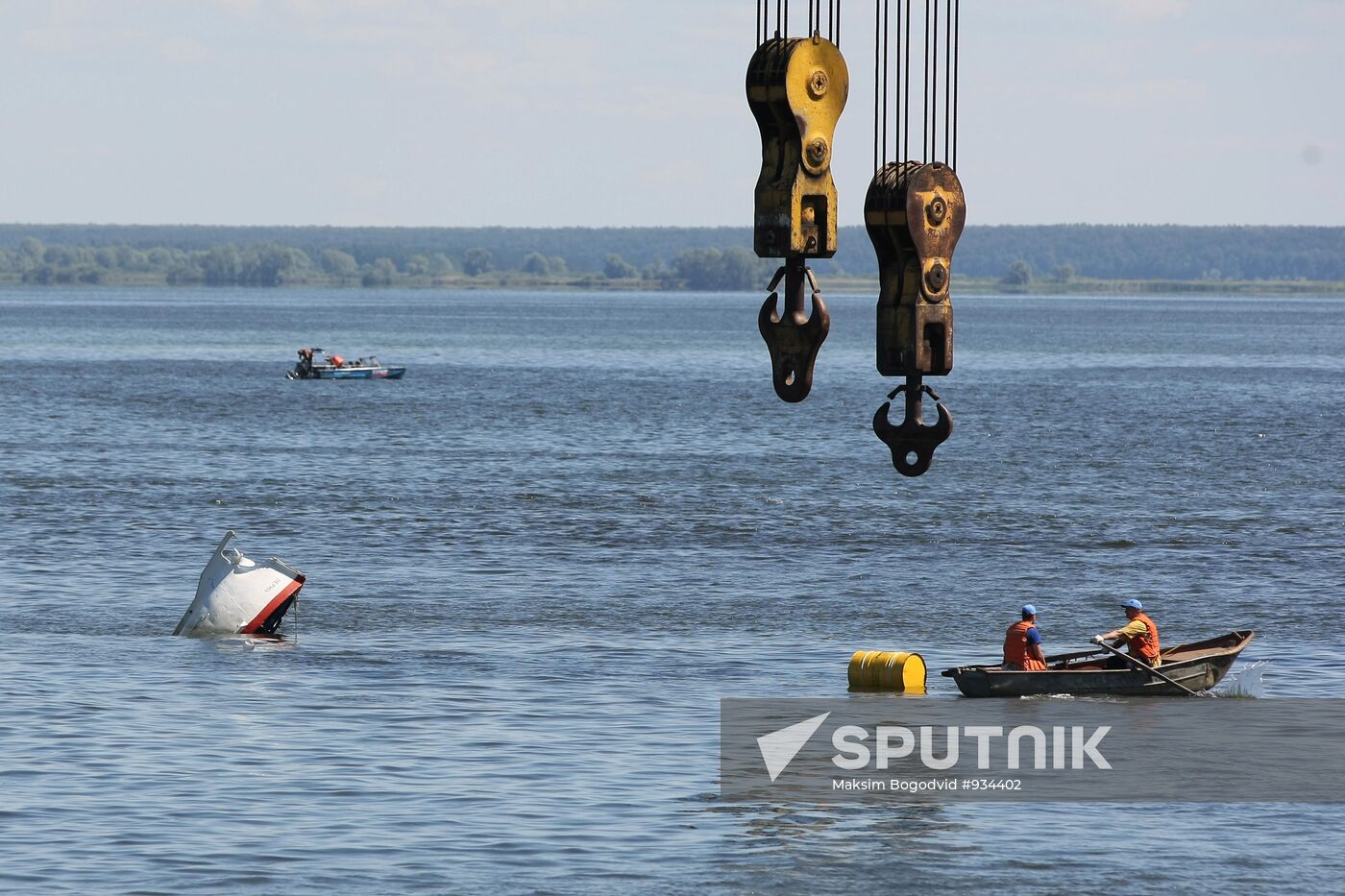 Two floating cranes preparing to lift the ship "Bulgaria"