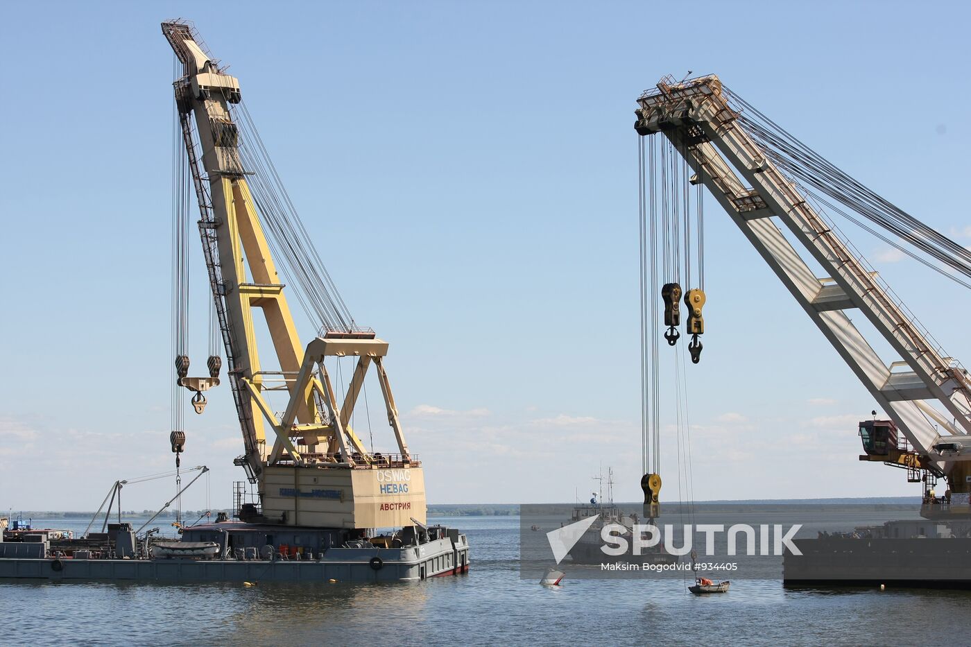 Two floating cranes preparing to lift the ship "Bulgaria"