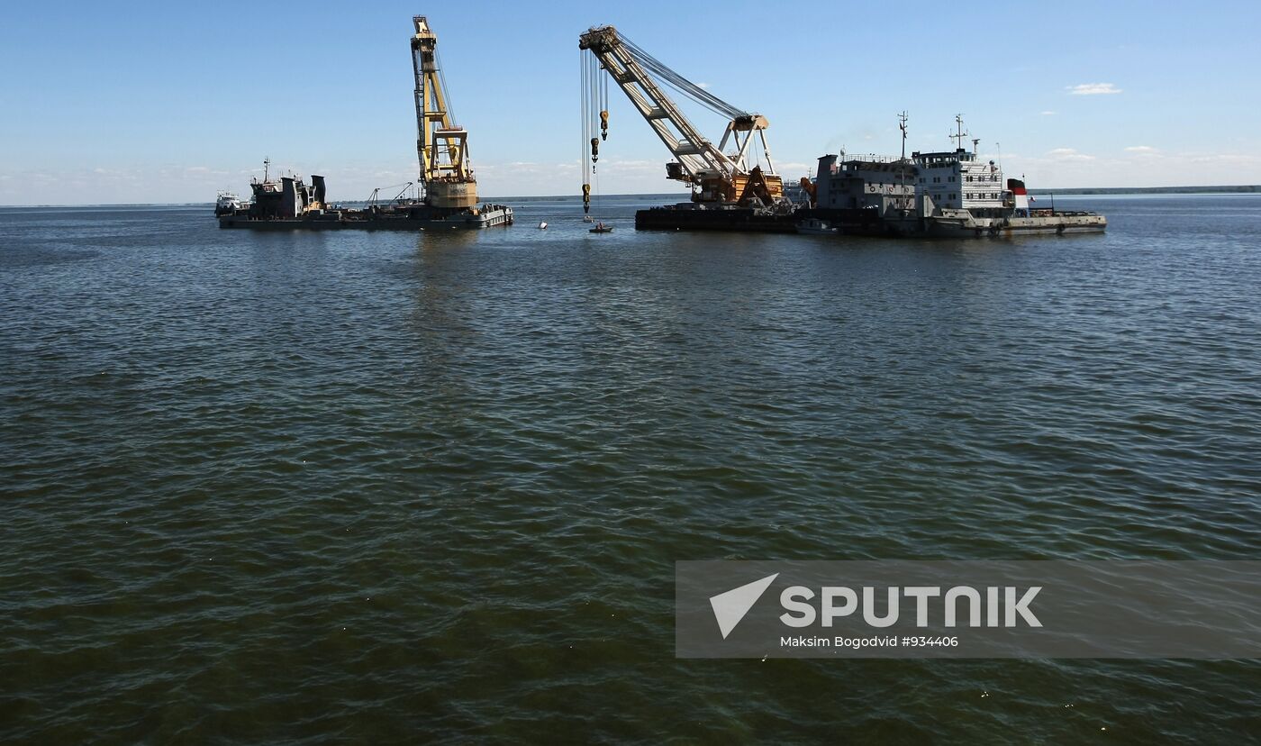 Two floating cranes preparing to lift the ship "Bulgaria"