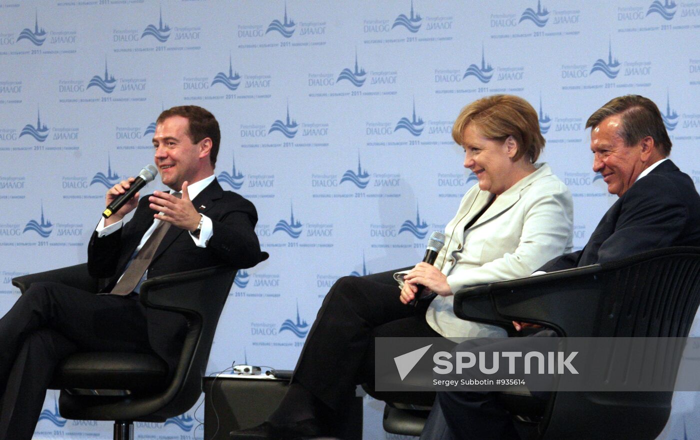 Dmitry Medvedev, Angela Merkel and Viktor Zubkov