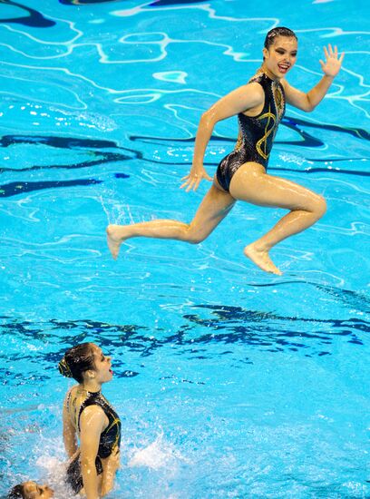 Macao's synchronized swimming team performs combination