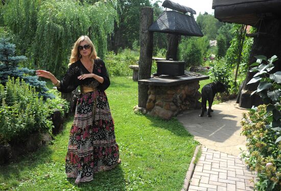 Vika Tsyganova in her country house