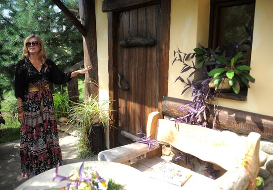 Vika Tsyganova in her country house