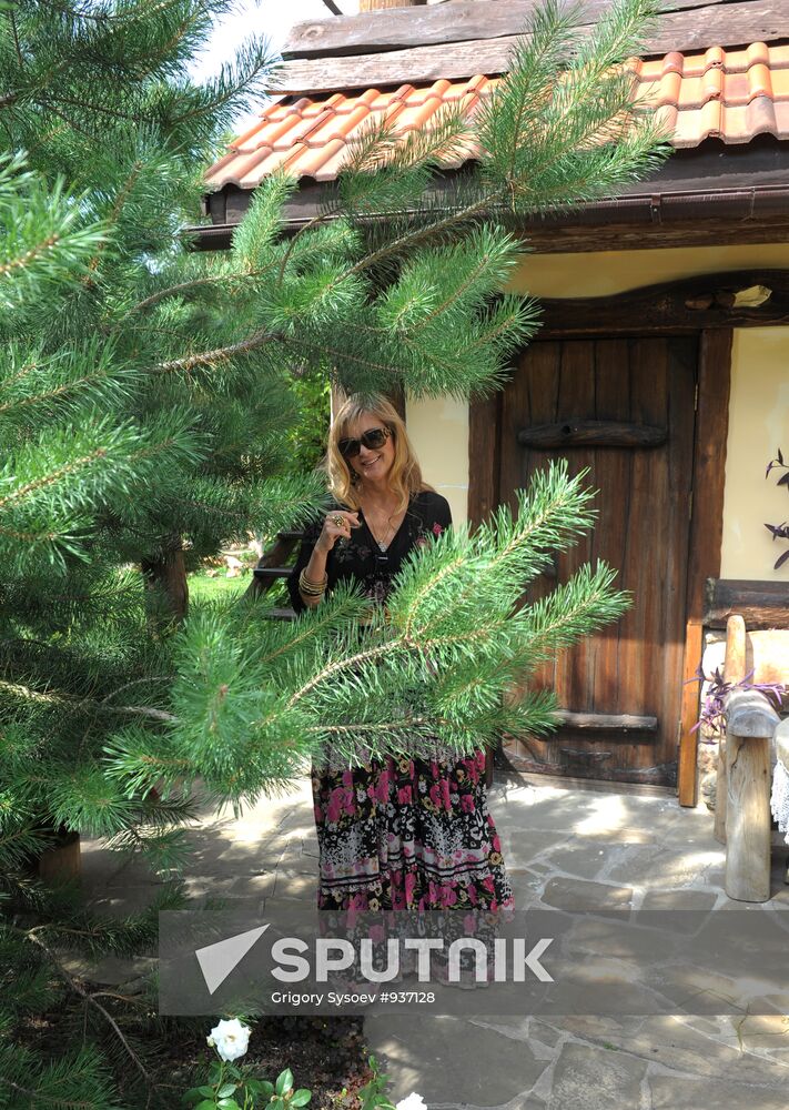 Vika Tsyganova in her country house