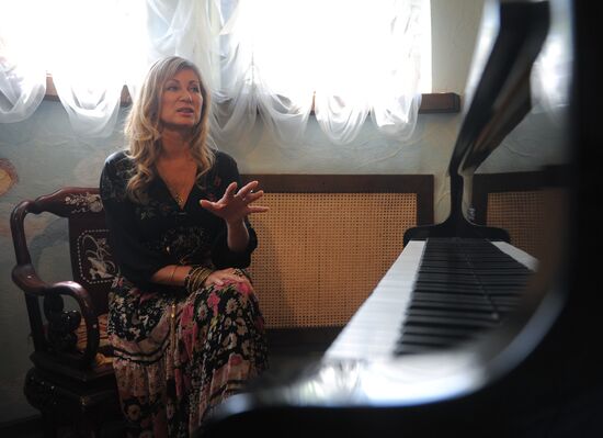 Vika Tsyganova in her country house