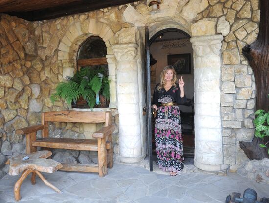 Vika Tsyganova in her country house