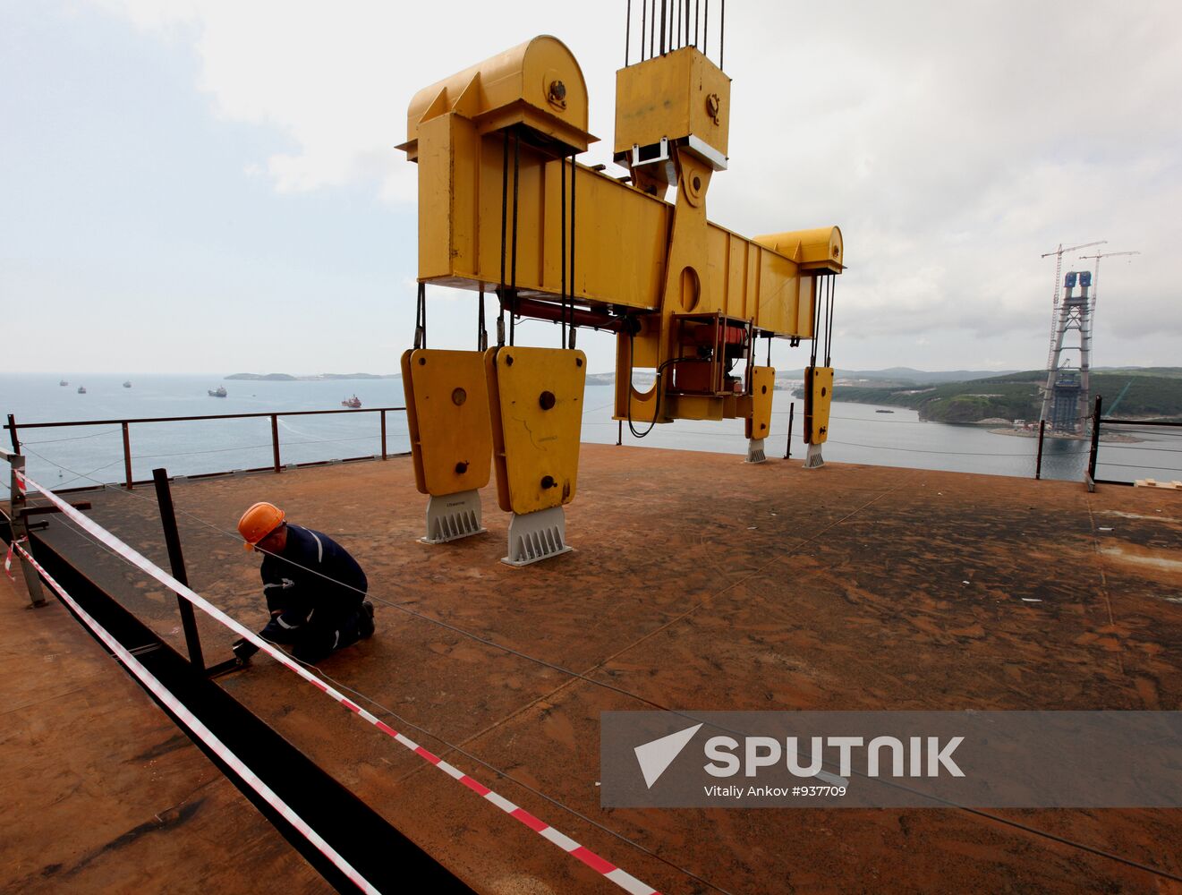 Panel of bridge to Russky Island is lifted from water