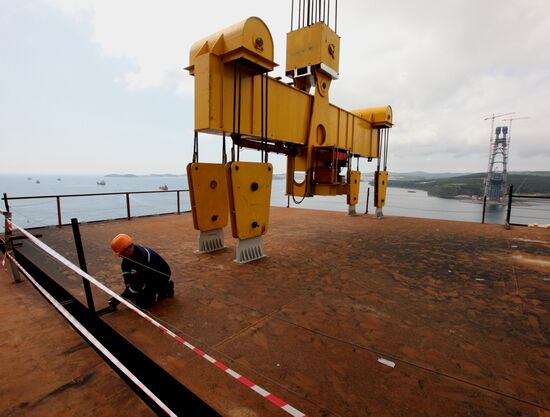 Panel of bridge to Russky Island is lifted from water