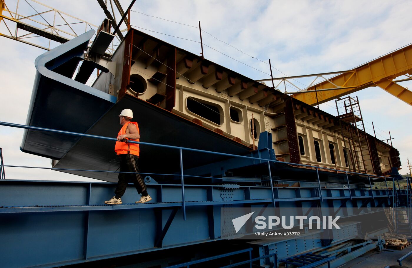Panel of bridge to Russky Island is lifted from water