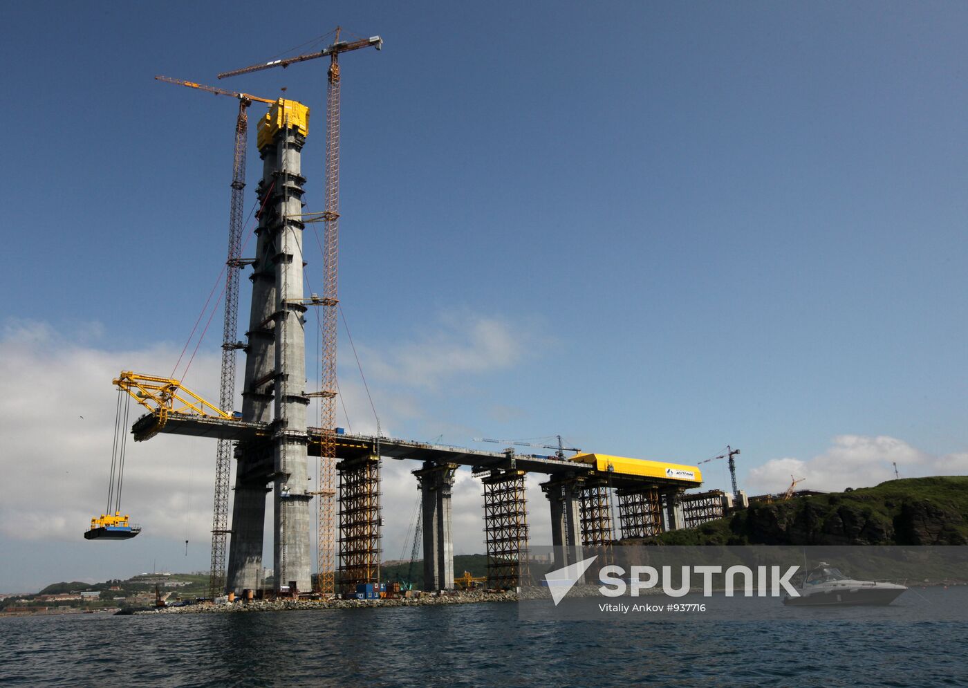 Panel of bridge to Russky Island is lifted from water