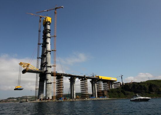 Panel of bridge to Russky Island is lifted from water
