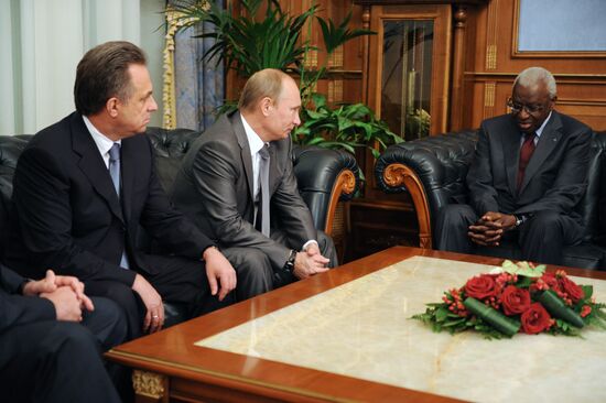 Vladimir Putin meets Lamine Diack in Moscow