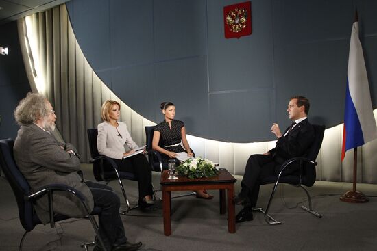 Russian President Dmitry Medvedev gives an interview to television and radio channels
