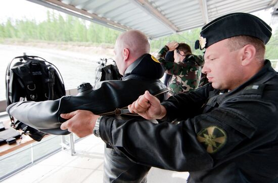 Military divers in training on Lake Baikal