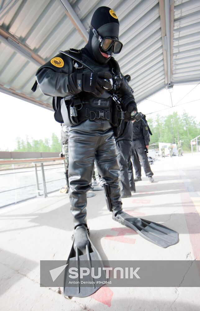 Military divers in training on Lake Baikal