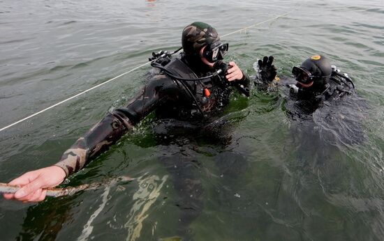 Military divers in training on Lake Baikal