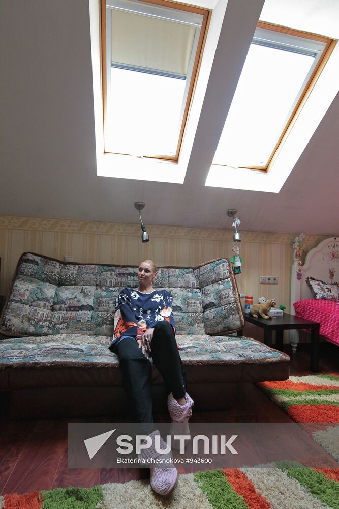 Ballerina Anastasia Volochkova in her house