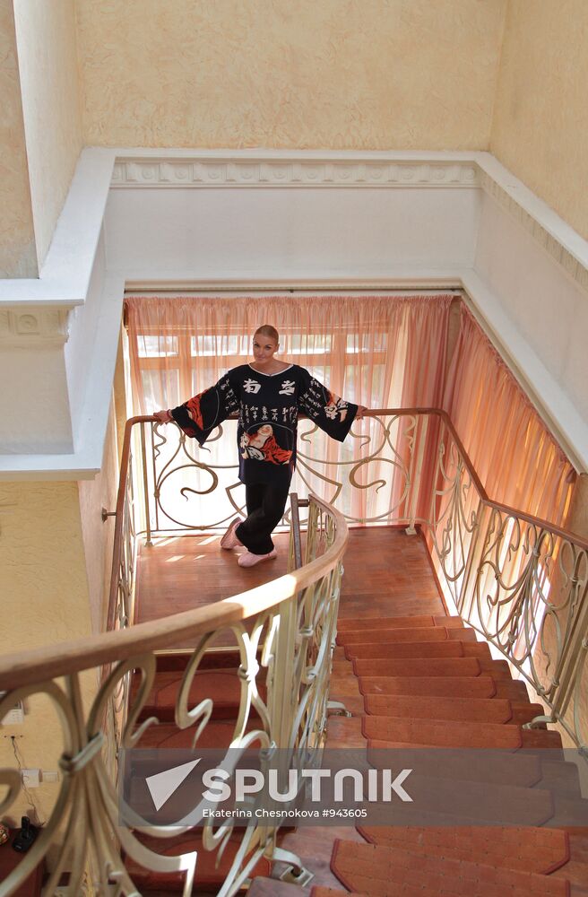 Ballerina Anastasia Volochkova in her house