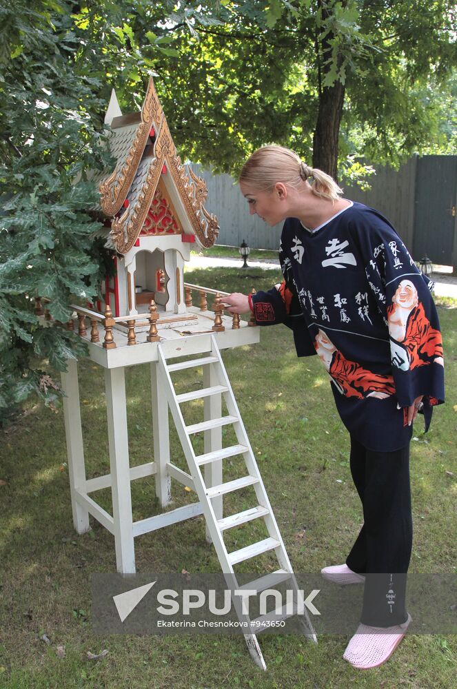 Ballerina Anastasia Volochkova in her house