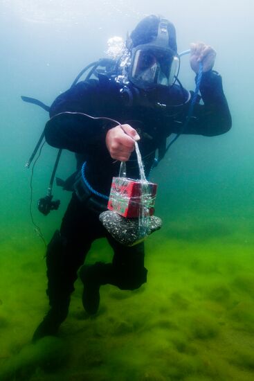 Explosive expert divers hold training drills at Lake Baikal