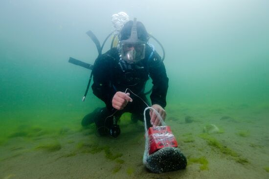 Explosive expert divers hold training drills at Lake Baikal