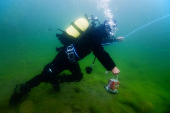Explosive expert divers hold training drills at Lake Baikal