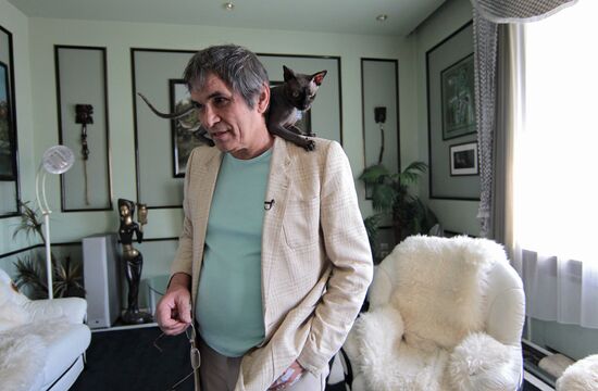 Music promoter Bari Alibasov in his home