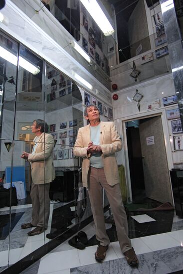 Music promoter Bari Alibasov in his home