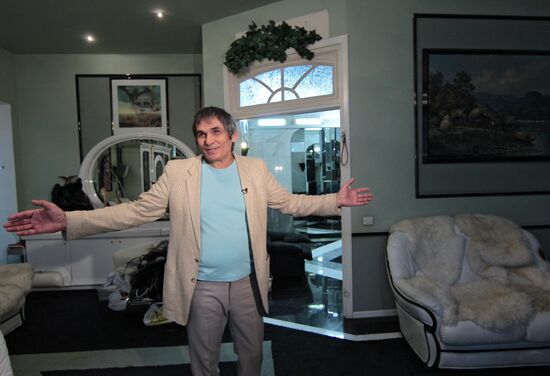 Music promoter Bari Alibasov in his home