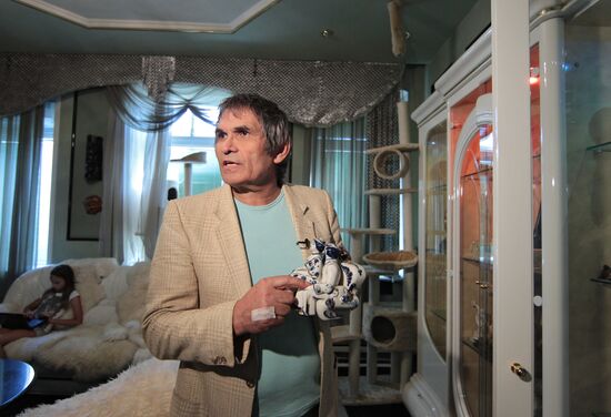 Music promoter Bari Alibasov in his home