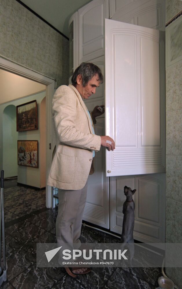 Music promoter Bari Alibasov in his home